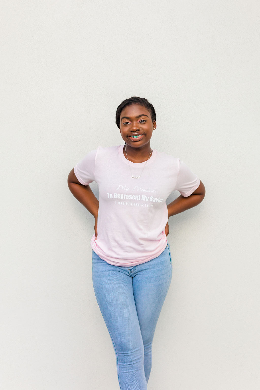 girl in a pink christian t shirt