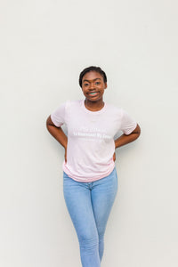 girl in a pink christian t shirt